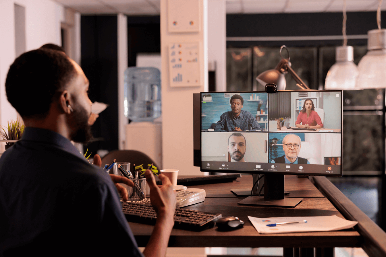 Remote team collaborating via video conference across multiple U.S. locations